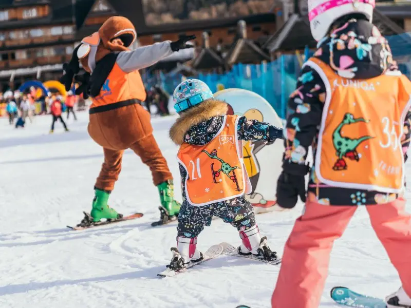 Stokuś, the ski school mascot, teaching the youngest proper posture